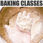 Hand of flour and butter cut together for making scones.