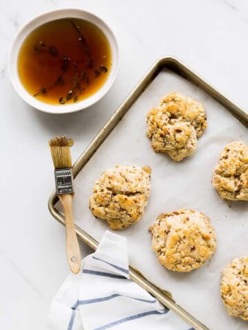 Bourbon-maple glazed cheddar bacon biscuits | bakeschool.com