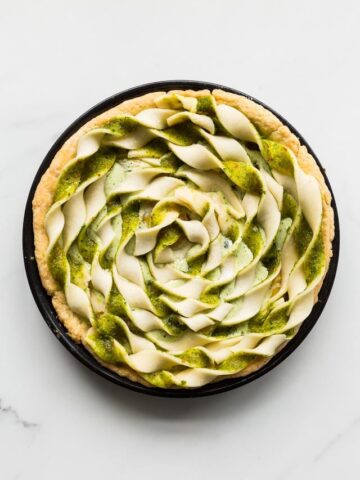 Bacon and egg pie with a decorative spiral pie crust