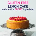 Single layer gluten-free lemon cake topped with homemade lemon curd and fresh raspberries served on a tarnished antique cake stand