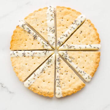 Perfect shortbread wedges- lavender shortbread cookies cut into triangles and dipped in white chocolate